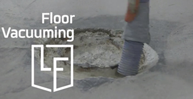 Vacuuming industrial concrete floor