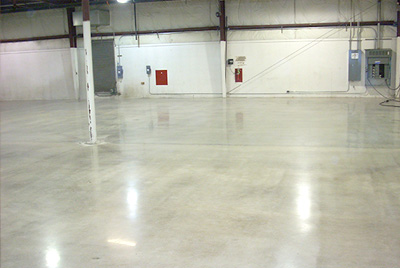 an empty warehouse showing floors by LiquidFloors